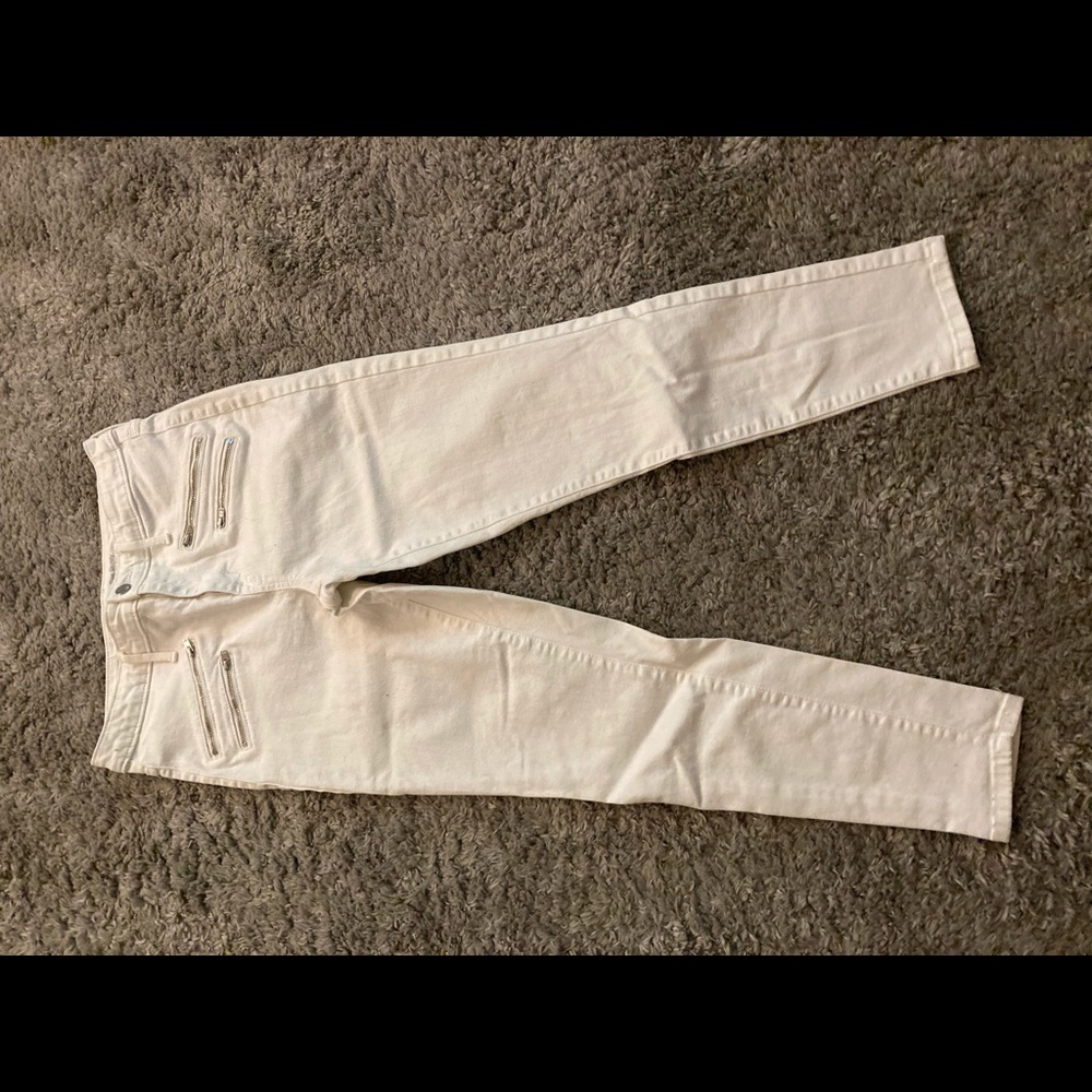White jeans with zippers